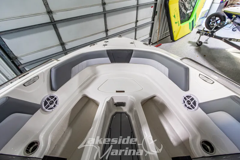 Slide: The Image of 2026 Chaparral 23 SSi boat interior with spacious seating and modern design. - 22