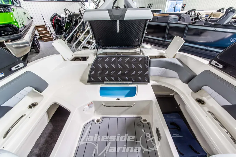 Slide: The Image of Interior view of 2026 Chaparral 23 SSi boat at Lakeside Marina showroom. - 9
