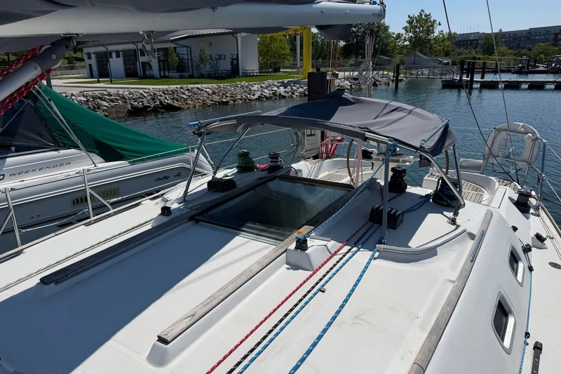 Slide: The Image of 2003 Jeanneau Sun Fast 37 sailboat docked, featuring deck and rigging details. - 9
