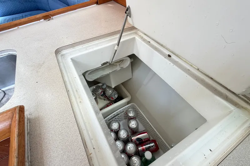 Slide: The Image of Built-in cooler with drinks on Jeanneau Sun Fast 37 yacht, 2003 model. - 25