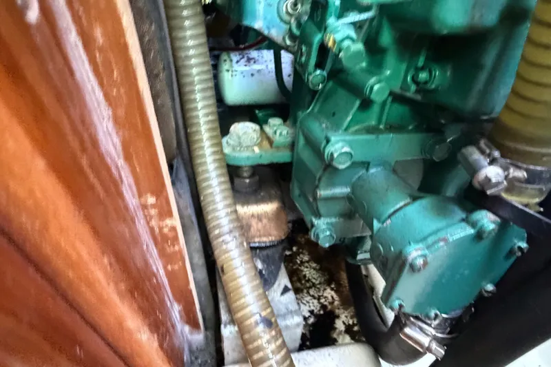 Slide: The Image of Engine compartment of a 2003 Jeanneau Sun Fast 37 sailboat, showing mechanical components. - 40
