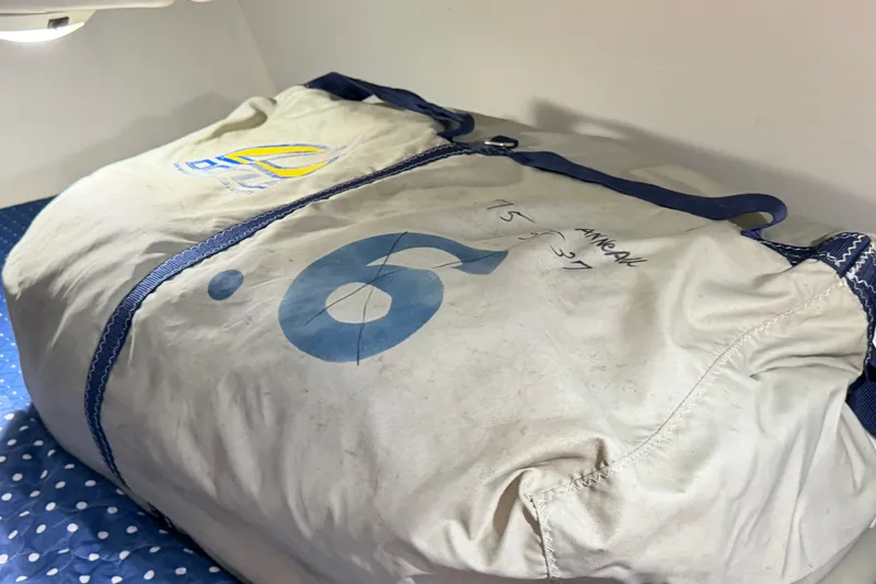 Slide: The Image of Sail bag on Jeanneau Sun Fast 37, 2003 model, with blue and white design. - 37