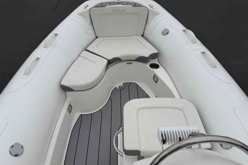 Slide: The Image of 2024 Zodiac Yachtline 490 interior with sleek seating and modern design. - 6