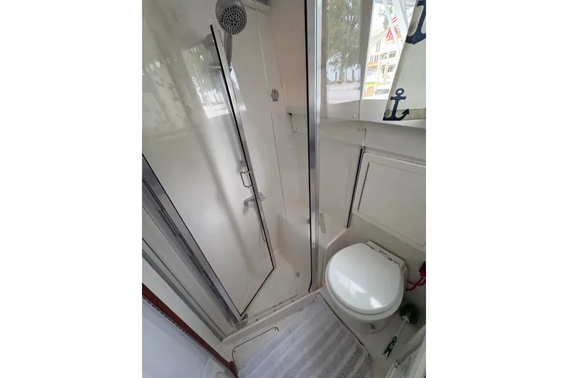 Slide: The Image of Bathroom interior of 2001 Blackfin 33 Flybridge boat with shower and toilet. - 17