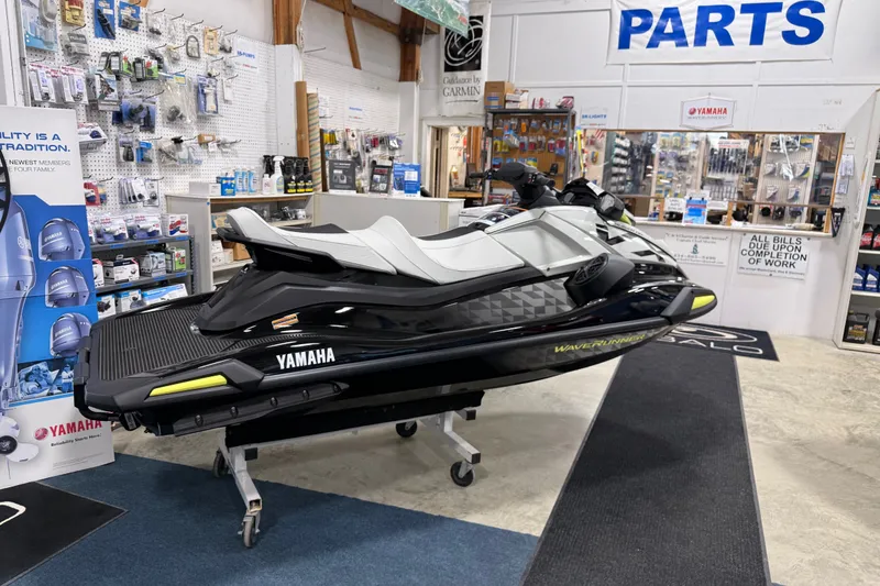 Slide: The Image of 2026 Yamaha WaveRunner VX Cruiser HO displayed in a parts store showroom. - 1