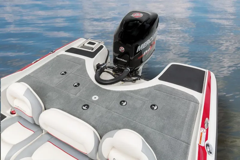 Slide: The Image of The image shows the rear of a 2016 Nitro Z-7 Sport boat with a Mercury engine. - 15