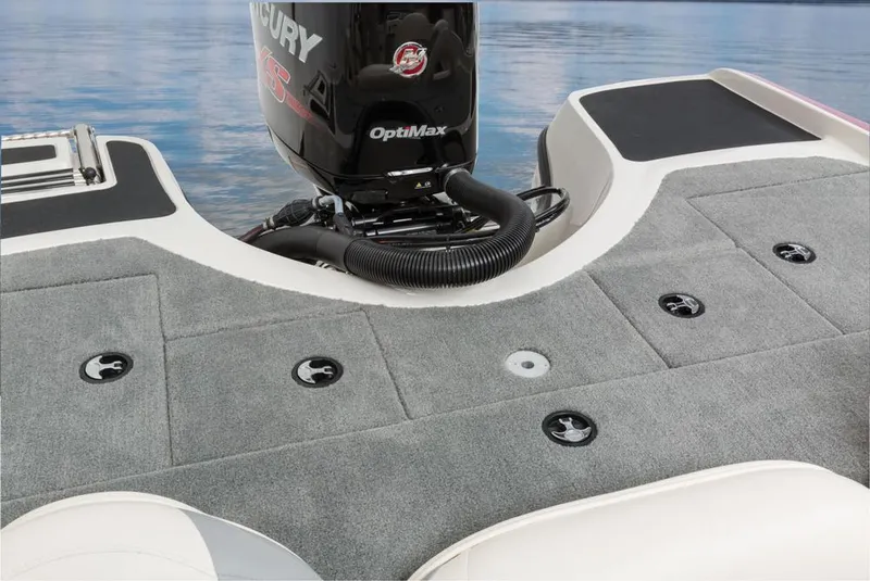 Slide: The Image of 2016 Nitro Z-7 Sport with Mercury OptiMax engine, gray carpeted deck, on calm water. - 18