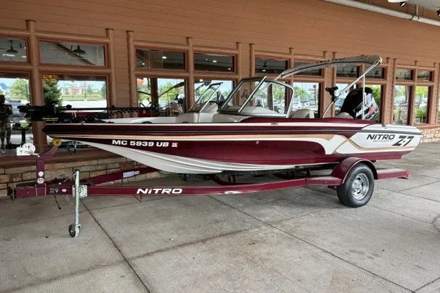 The Image of 2016 Nitro Z-7 Sport boat on trailer, parked outside a building. - 0