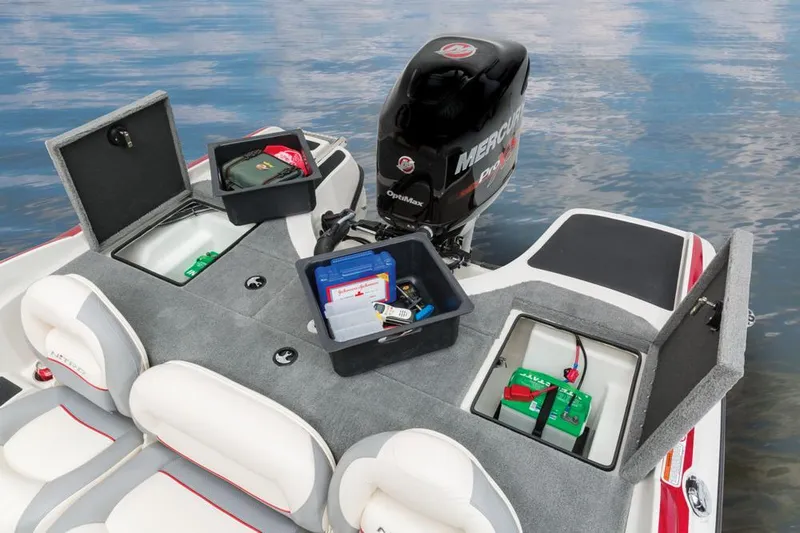 Slide: The Image of The image shows the rear of a 2016 Nitro Z-7 Sport boat with open storage compartments. - 20