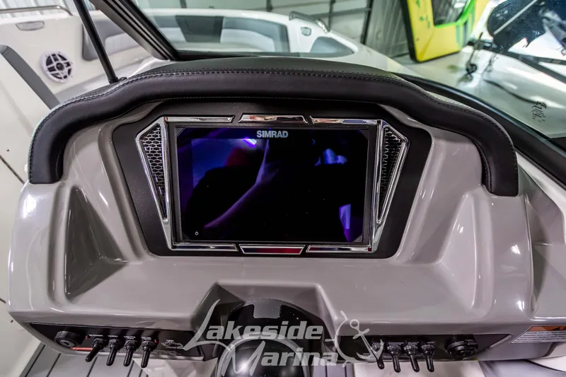 Slide: The Image of Dashboard of 2026 Chaparral 21 SSi boat with Simrad display at Lakeside Marina. - 14