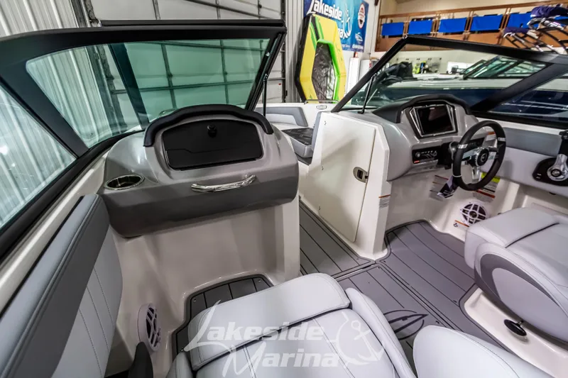 Slide: The Image of Interior of 2026 Chaparral 21 SSi boat at Lakeside Marina showroom. - 16