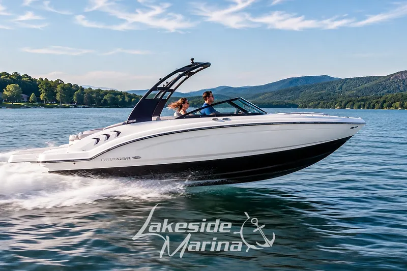 The Image of 2026 Chaparral 21 SSi speedboat cruising on a scenic lake with mountains in the background. - 0