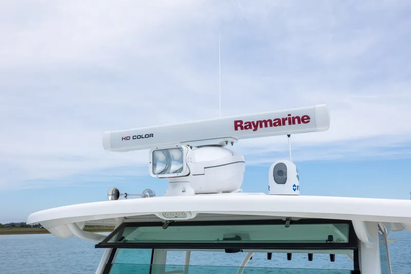 Slide: The Image of Boston Whaler 370 Outrage 2017 with Raymarine HD Color radar on the roof. - 40