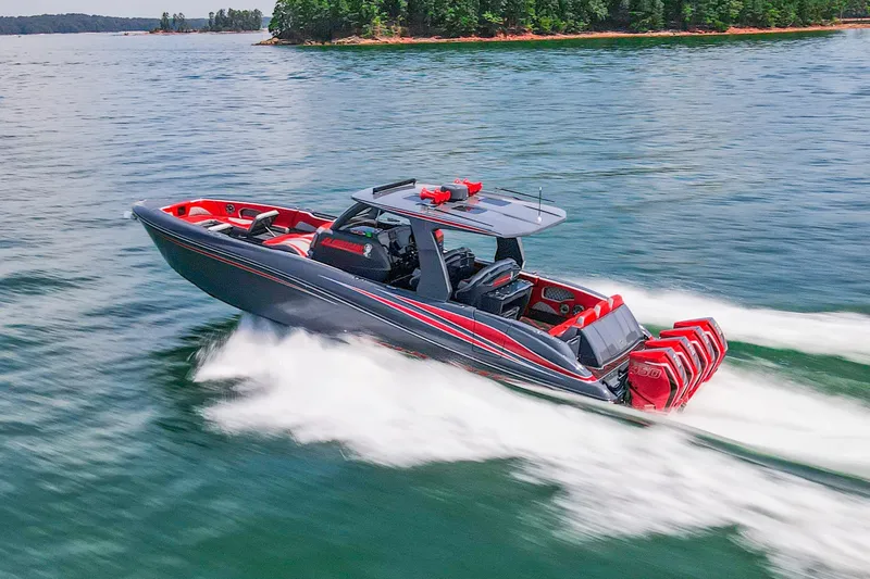 Slide: The Image of 2022 Deep Impact 399 Sport boat speeding on a lake with powerful engines. - 93