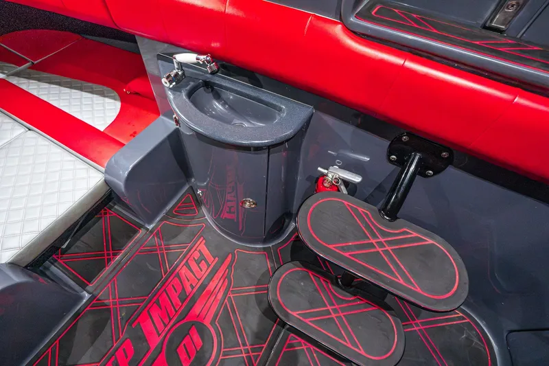 Slide: The Image of Interior of 2022 Deep Impact 399 Sport boat with red and gray accents. - 87