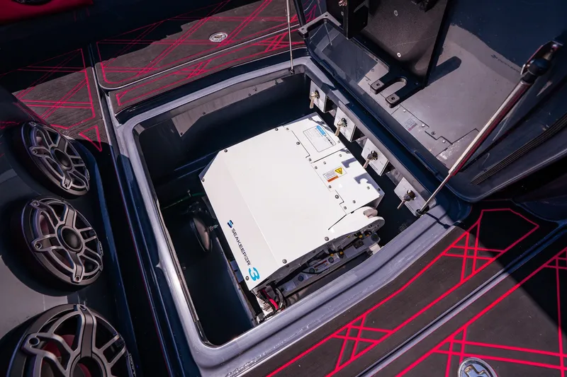 Slide: The Image of 2022 Deep Impact 399 Sport boat featuring Seakeeper 3 stabilizer in open compartment. - 73