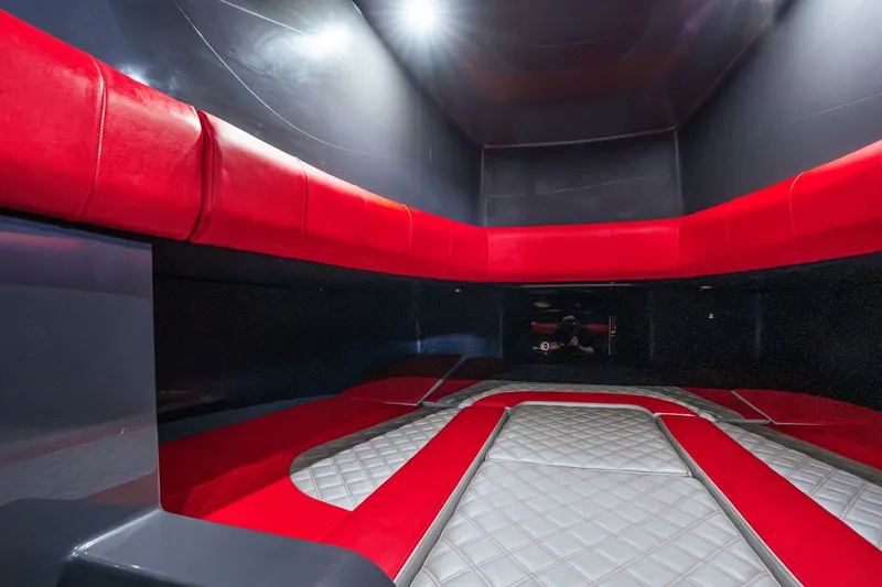 Slide: The Image of Luxurious interior of 2022 Deep Impact 399 Sport boat with red and gray seating. - 83