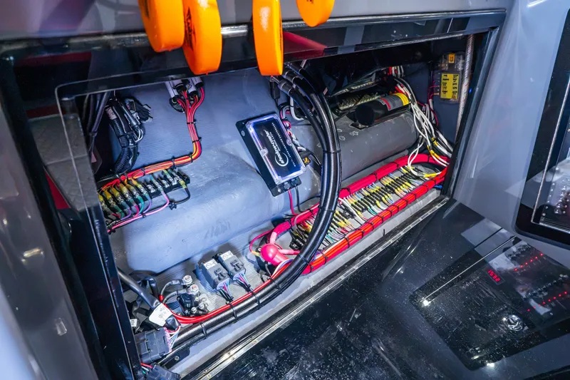 Slide: The Image of Electrical system inside 2022 Deep Impact 399 Sport boat, showcasing wiring and components. - 90