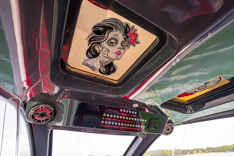Slide: The Image of Interior of 2022 Deep Impact 399 Sport boat with artistic ceiling design and speakers. - 55