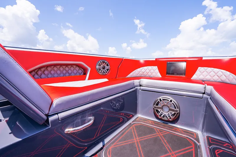 Slide: The Image of Luxurious interior of 2022 Deep Impact 399 Sport boat with red and gray seating. - 38