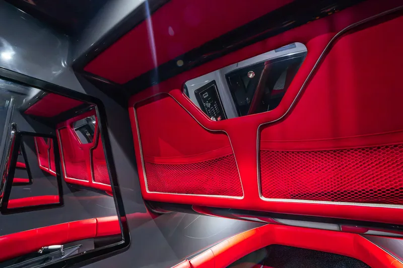 Slide: The Image of Interior of 2022 Deep Impact 399 Sport boat with sleek red and black design. - 88