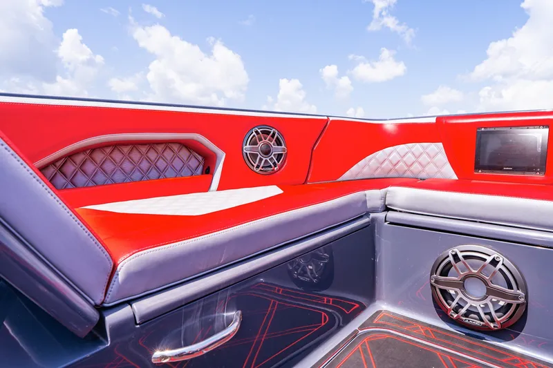 Slide: The Image of Luxurious interior of 2022 Deep Impact 399 Sport boat with red and white seating. - 39
