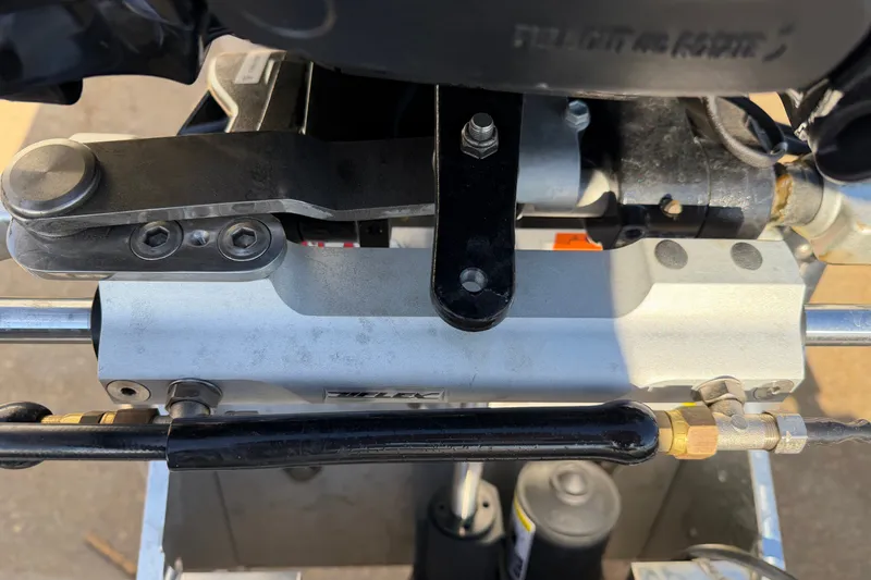 Slide: The Image of Close-up of Skuta 21 Tournament V 2026 boat steering mechanism. - 58