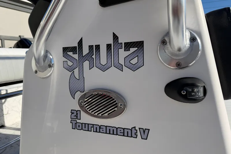 Slide: The Image of 2026 Skuta 21 Tournament V boat logo and details on white surface. - 33