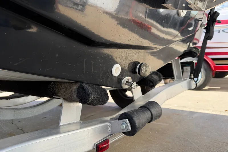 Slide: The Image of Close-up of 2026 Skuta 21 Tournament V boat hull on trailer. - 27