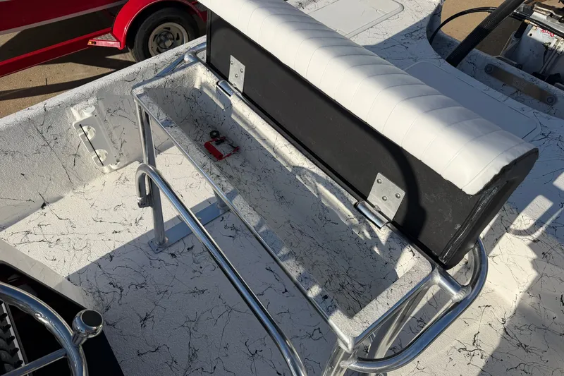 Slide: The Image of Interior of 2026 Skuta 21 Tournament V boat with white seating and metal railing. - 59
