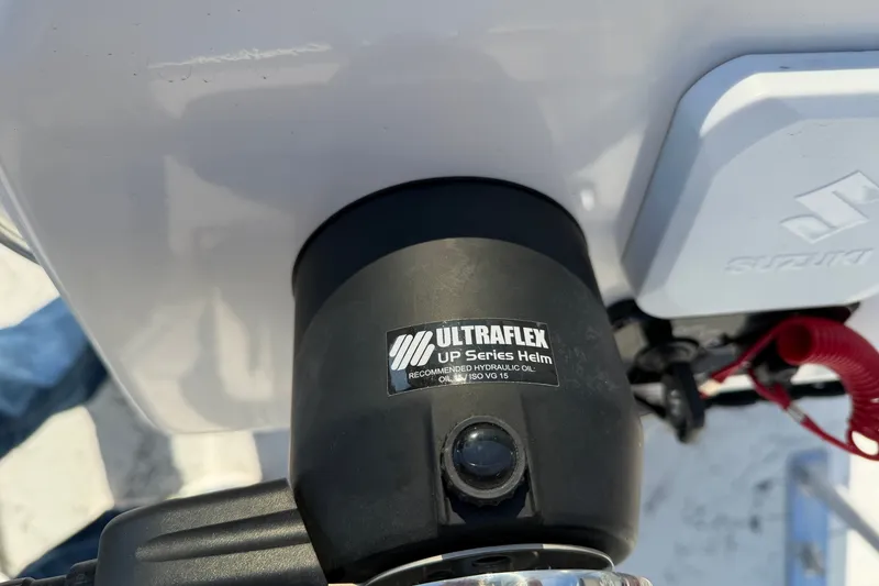 Slide: The Image of Ultraflex UP Series Helm on Skuta 21 Tournament V, 2026 model, with Suzuki component. - 63