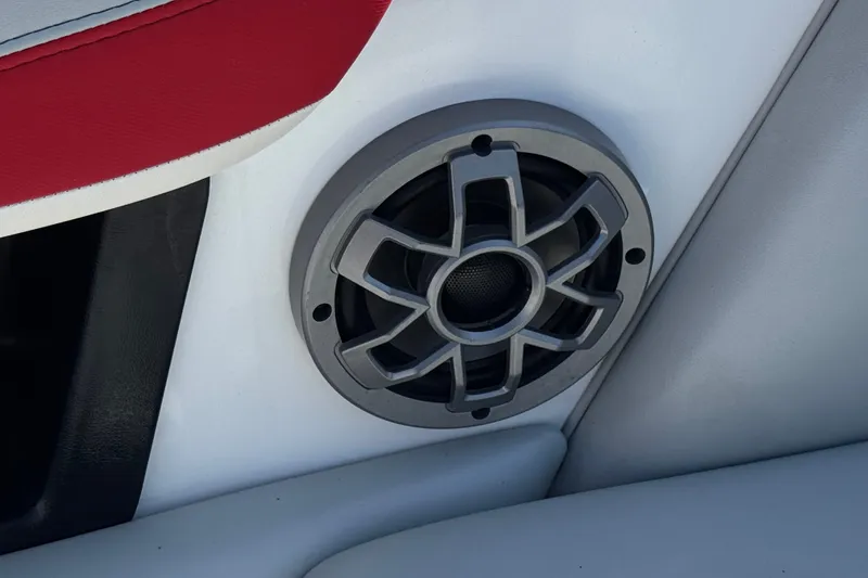 Slide: The Image of Speaker detail in 2022 Axis T23 boat interior with red and gray upholstery. - 25