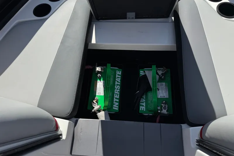 Slide: The Image of 2022 Axis T23 boat battery compartment with Interstate batteries installed. - 14