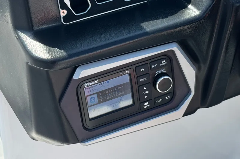Slide: The Image of 2022 Axis T23 boat dashboard with Bluetooth stereo system and control panel. - 30