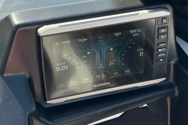 Slide: The Image of Garmin display in 2022 Axis T23 boat showing speed, RPM, and various engine metrics. - 33