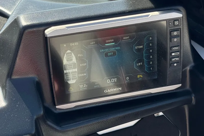 Slide: The Image of Garmin display in 2022 Axis T23 boat showing cruise control and fuel information. - 32