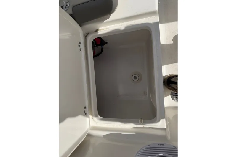 Slide: The Image of Open storage compartment on 2026 Key West 189 FS boat, showcasing interior space. - 10