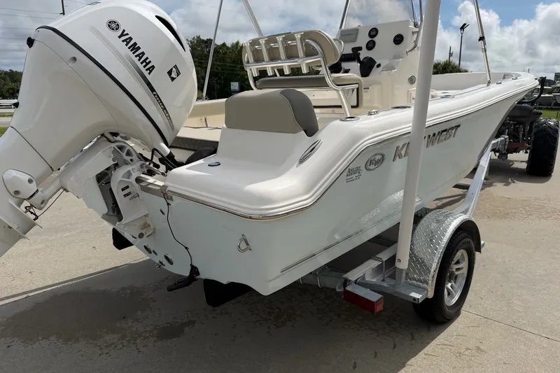 Slide: The Image of 2026 Key West 189 FS boat with Yamaha outboard motor on trailer. - 5