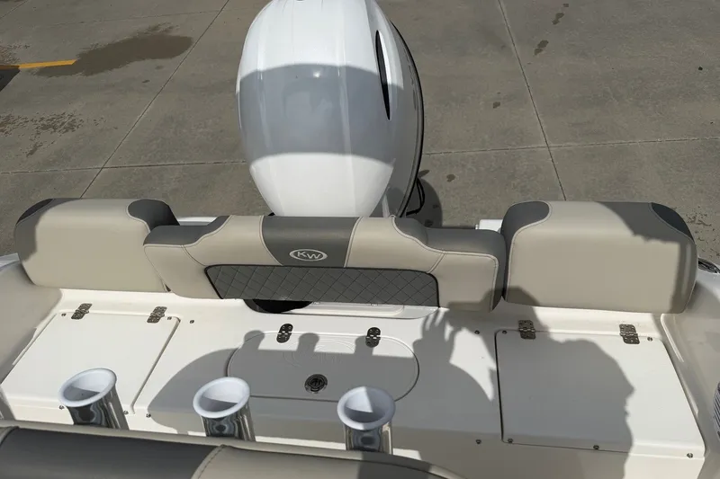 Slide: The Image of 2026 Key West 189 FS boat stern view with seating and motor detail. - 8