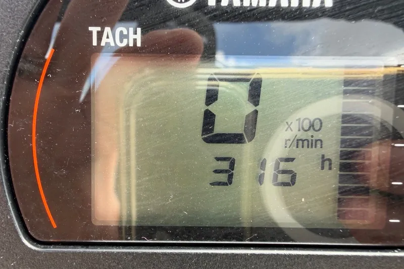 Slide: The Image of Tachometer display showing 0 RPM and 316 hours on a Yamaha engine. - 14