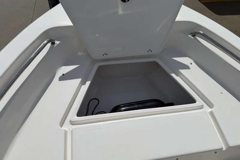 Slide: The Image of Open storage compartment on 2026 Key West 189 FS boat deck. - 22