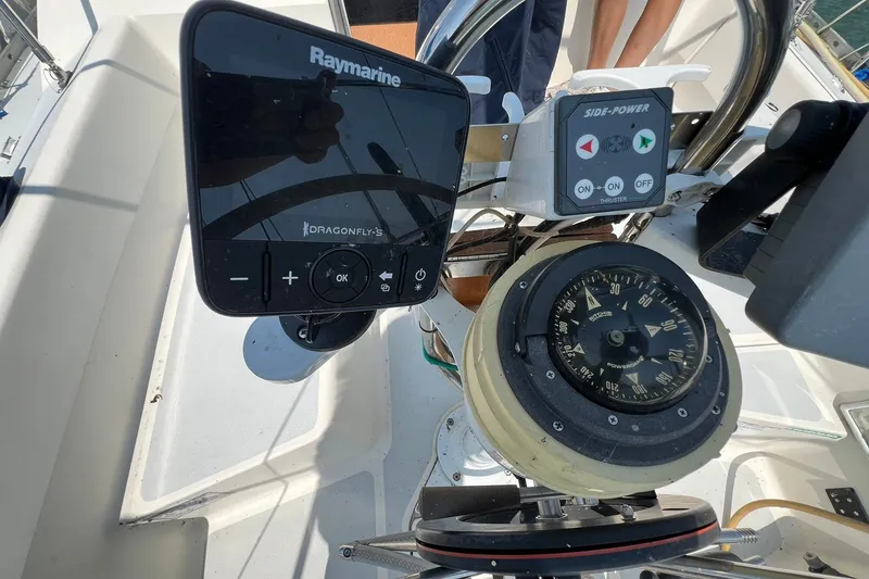 Slide: The Image of Cockpit of 1990 Hunter Legend 35.5 sailboat with navigation instruments. - 12