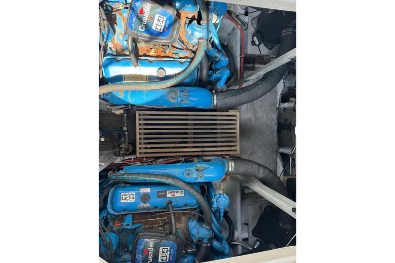 Slide: The Image of Engine compartment of a 1990 Silverton 34 Express boat with Crusader 454 engines. - 27