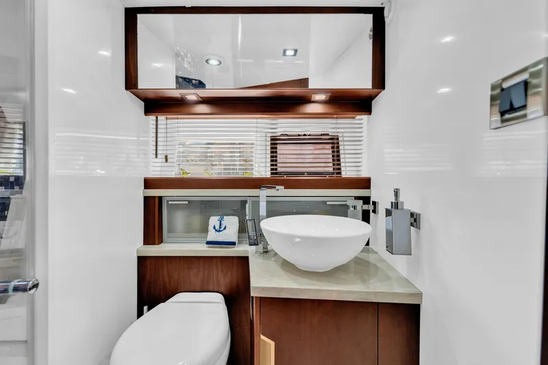 Slide: The Image of Luxurious bathroom in 2016 Galeon 430 HTC yacht with modern fixtures and elegant design. - 29
