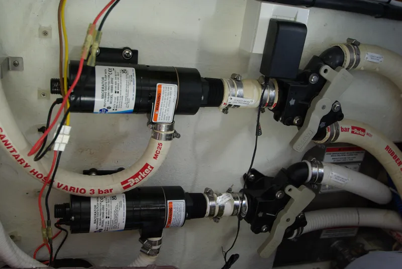 Slide: The Image of Close-up of pumps and hoses in the engine room of a 2016 Galeon 430 HTC. - 59