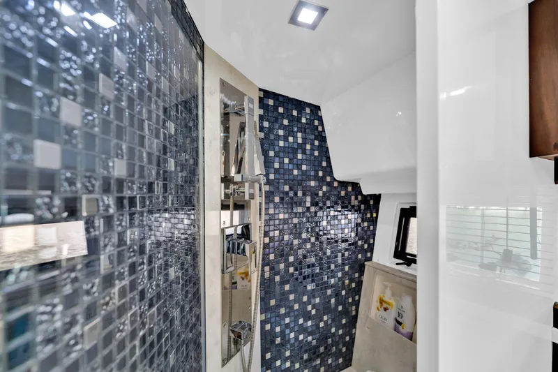 Slide: The Image of Luxurious bathroom with mosaic tiles in 2016 Galeon 430 HTC yacht. - 28