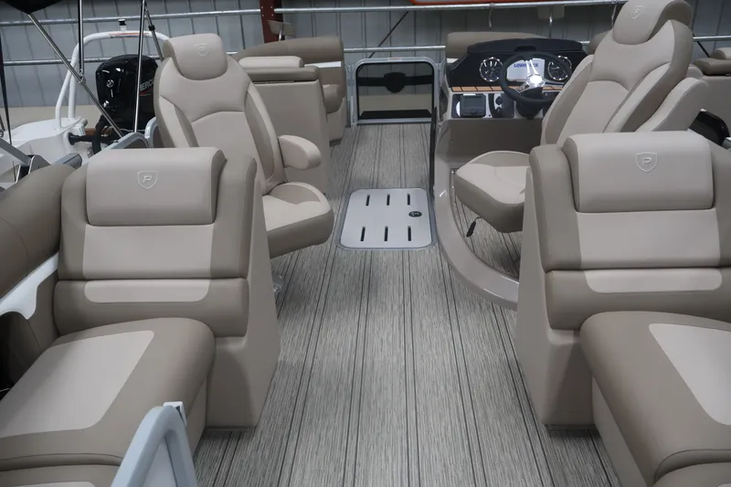 Slide: The Image of Luxurious interior of 2026 Premier 210 Sunsation RF - CL pontoon boat with plush seating. - 25