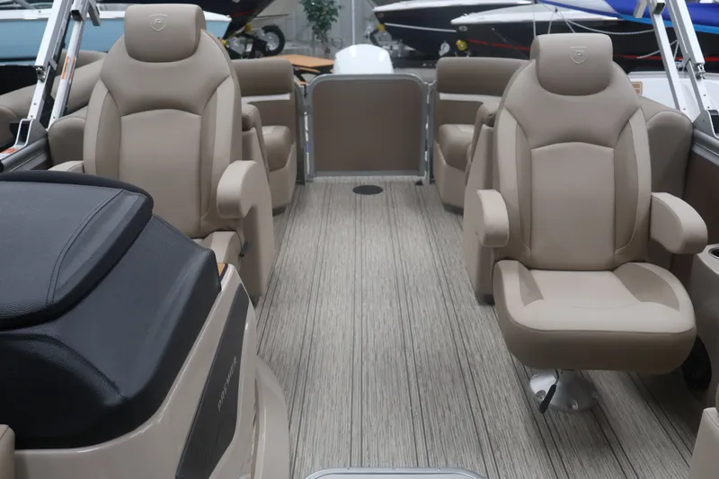 Slide: The Image of Luxurious interior of 2026 Premier 210 Sunsation RF - CL pontoon boat with plush seating. - 16