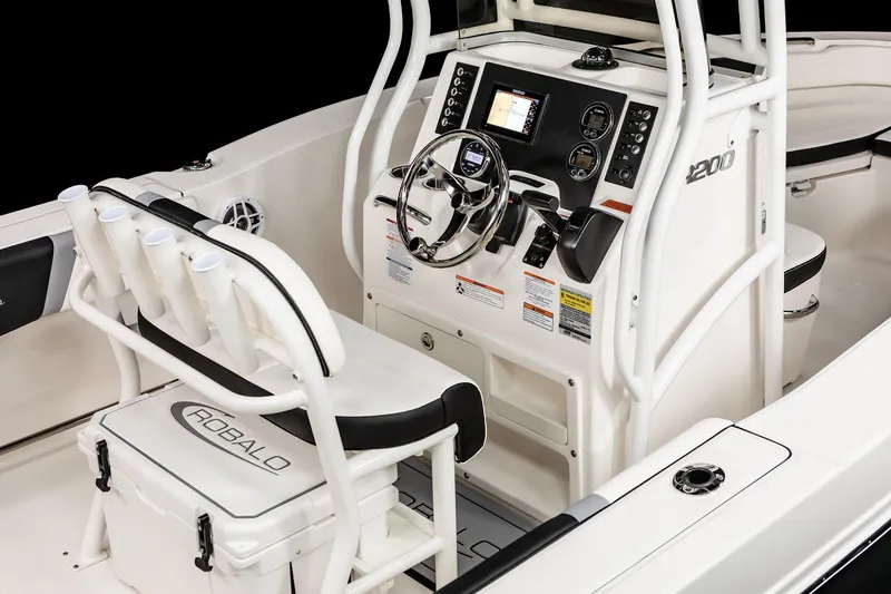 Slide: The Image of Manufacturer Provided Image: 2025 Robalo R200 Center Console boat interior with advanced navigation system and seating. - 18