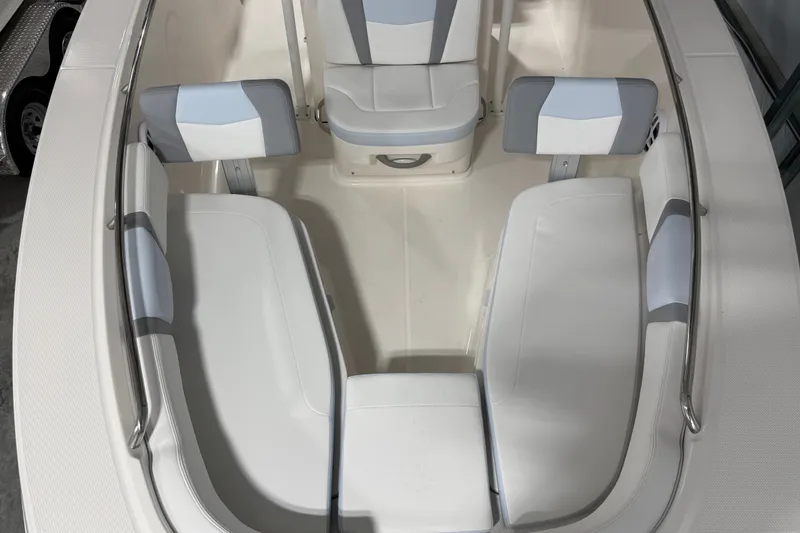 Slide: The Image of 2026 Robalo R200 Center Console boat interior with cushioned seating and sleek design. - 11